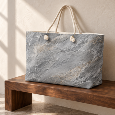 Toscana Marble weekender tote with cream rope handles on a walnut bench; styled mockup.